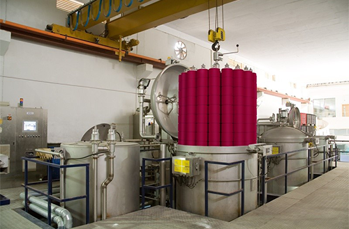 Yarn package dyeing machines